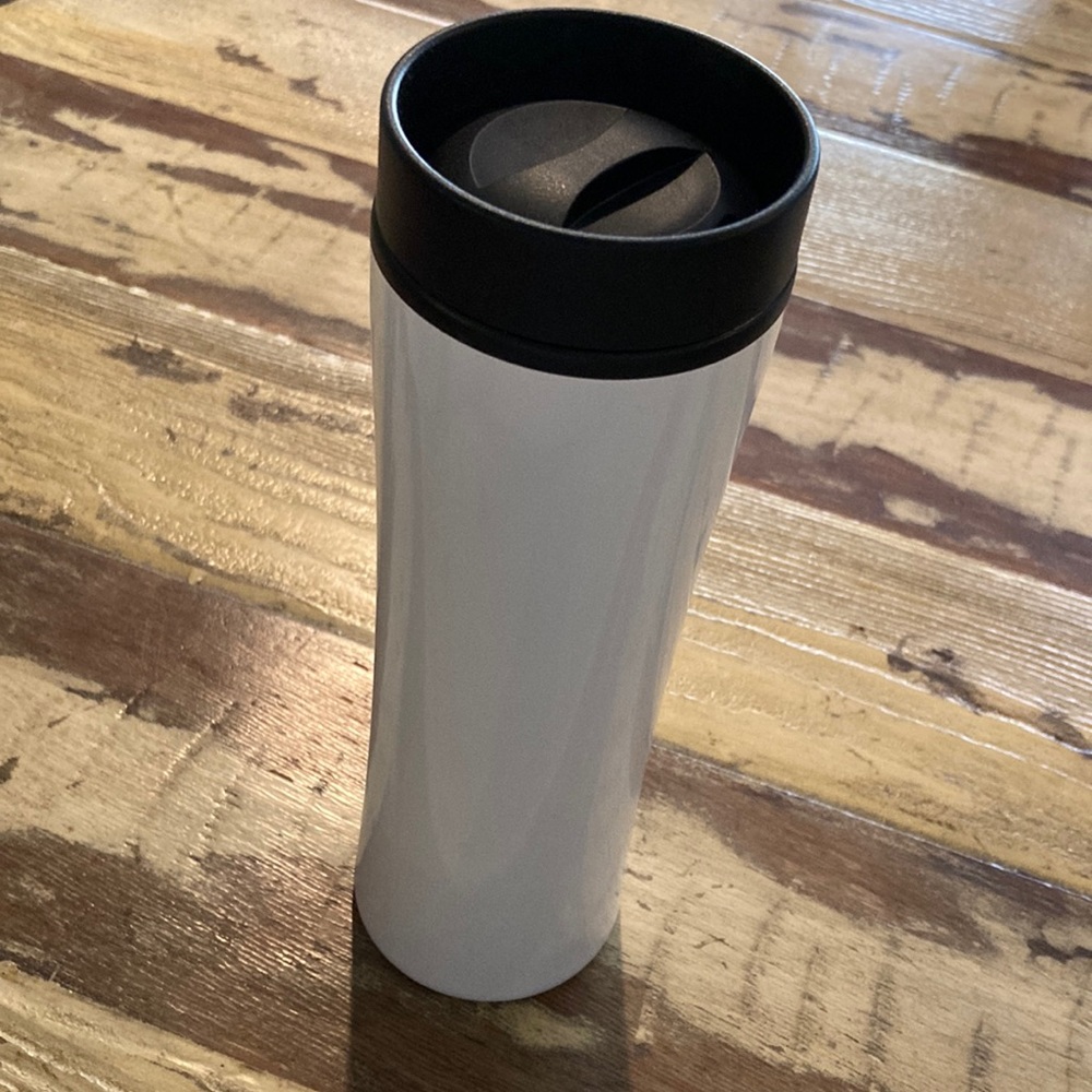 NEVER USED WHITE THERMOS/WATER BOTTLE WITH SCREW TOP THAT TWISTS OFF!